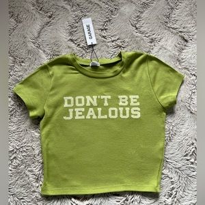 Garage green cropped tee.